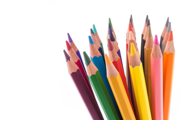 Close up color pencils isolated on white.