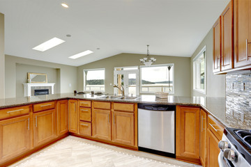 Luxury kitchen room with bright brown cabinets