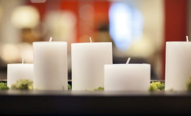 Group of white thick candles.