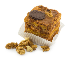 cake with walnuts isolated on white background