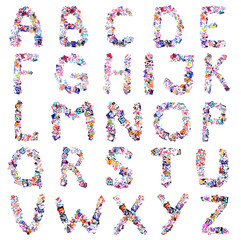 Colorful newspaper alphabet isolated on white