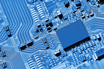 Electronic circuit board close up.