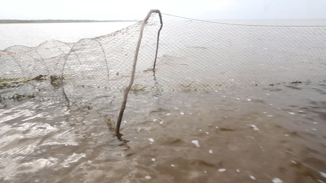 fishing net  a fish-trap on lake