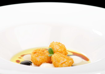 Fine dining, deep fried scallops  with olive oil, cheese