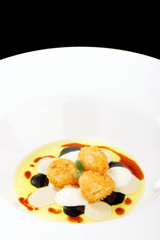 Fine dining, deep fried scallops  with olive oil, cheese