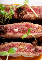 Obraz premium Fine dining, Angus Beef Steak fillets with Roasted tomato