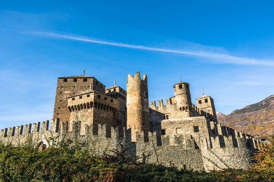 Wall and towers of Fenis Castle in Aosta Valley