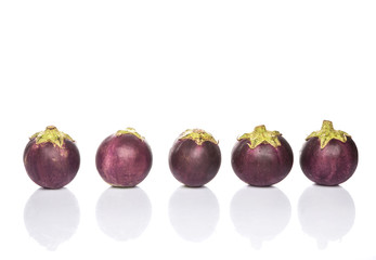 Round shape eggplant over white background
