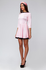 Beautiful woman on light grey background