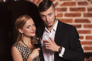 Couple drinking wine at winery