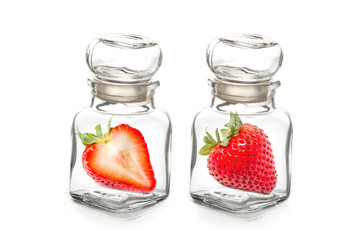 Strawberry in the  glass bottle