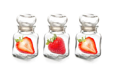 Strawberry in the  glass bottle