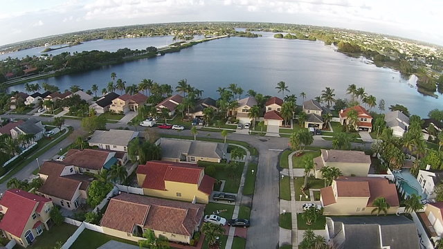 Suburban waterfront homes in Florida aerial view