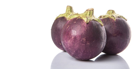 Round shape eggplant over white background
