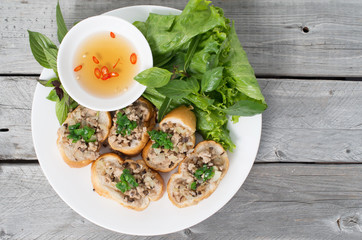 Vietnamese steamed bread with pork and chopped green onion - ban