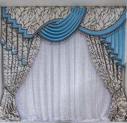 Turquoise curtains with lambrequins