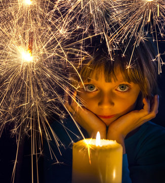 girl with a candle and sparkler
