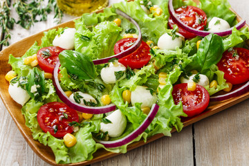 salad with mini mozzarella and tomatoes corn