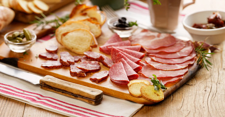 Meat board. Cured meat. Charcuterie.