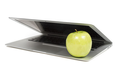 Laptop Closing on an Apple