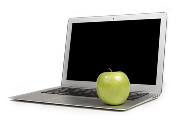 Focus on Green Apple on a Laptop