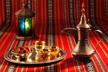 Zelfklevend Fotobehang Midden-Oosten Iconic Abrian fabric tea and dates symbolise Arabian hospitality