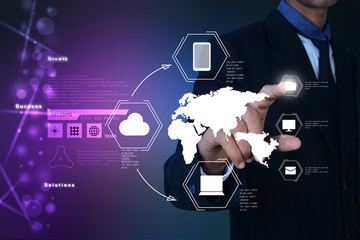 Businessman pressing virtual buttons