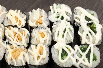 Some sushi on wood background