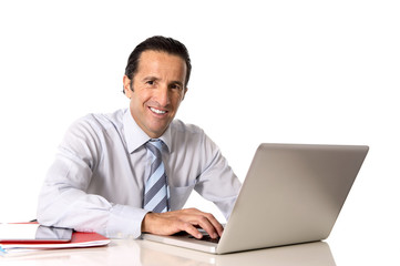 senior businessman working on computer at office desk