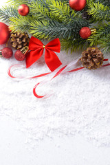 Christmas composition on snow close-up