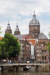 Fototapeta premium Canal and St. Nicolas Church in Amsterdam