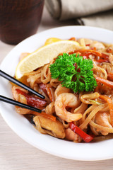 Chinese noodles with vegetables and seafood