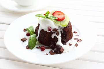 Hot chocolate pudding with fondant centre with ice-cream,