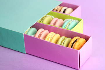 Assortment of gentle colorful macaroons in box