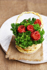 Smoked cheese in shape of basket on table