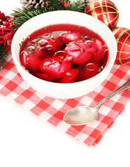 Traditional polish clear red borscht with dumplings and