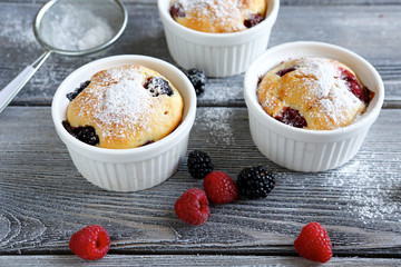 Three muffin with summer berries
