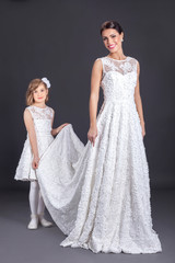 Bride With young little Bridesmaids, indoor studio shot