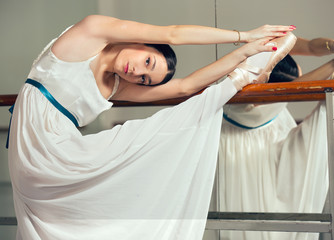  Classic ballet dancer in white tutu posing next to handle bar © Mediteraneo