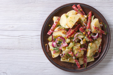 potato salad with salami top view horizontal