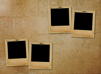 Old paper slides for photos on rusty abstract background