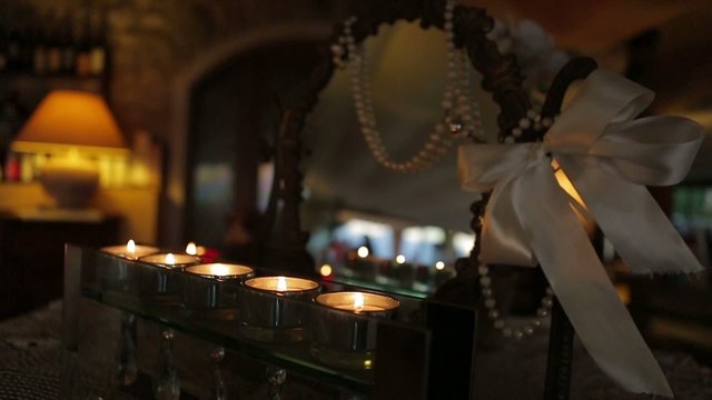 beautiful romantic candles in the cozy restaurant