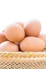 brown chicken eggs in basket