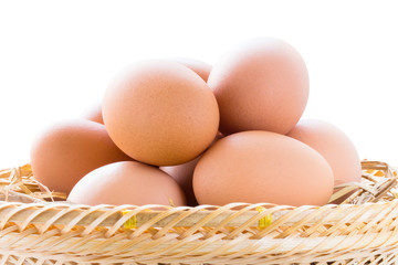 brown chicken eggs in basket