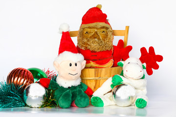 Christmas doll on white background, christmas souvenir