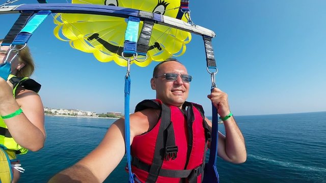 Tourists flying on a parachute, parasailing, Alanya Turkey 5