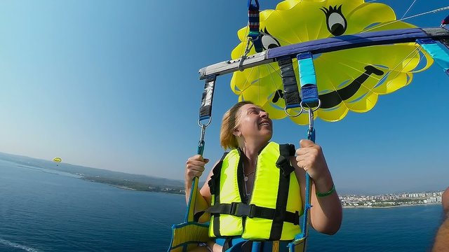 Tourists flying on a parachute, parasailing, Alanya Turkey 3