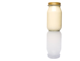 Mayonnaise in a jar over white background