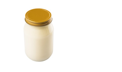 Mayonnaise in a jar over white background