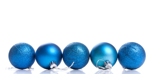Five blue christmas decoration ball on a white background with s
